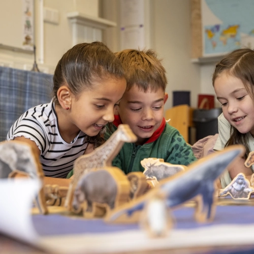three-kids-engaged-and-delighted-exploring-a-worl-2025-04-05-04-27-56-utc